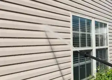 High heating and cooling bills linked to failing siding and poor insulation on a Calgary home