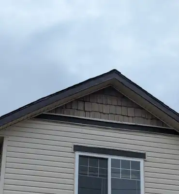 Gutter repair Calgary - Blueprint Construction fixing residential gutters in Calgary